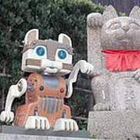 кошка-робот заманивает японцев в музей